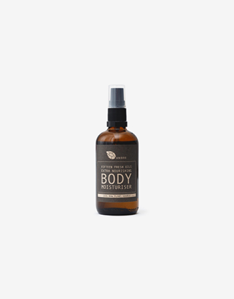 Botanical body oil in amber glass